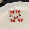 Elegant Red Zirconia Butterfly Clip-On Earrings