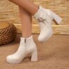 Elegant White Ankle Boots with Metallic Buckle Accent