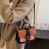 A Stylish Handbag Featuring a New Retro Floral Design with Contrasting Elements