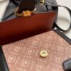 A Stylish Handbag Featuring a New Retro Floral Design with Contrasting Elements